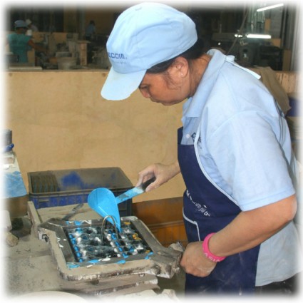 Pouring colours into the mould as the first layer