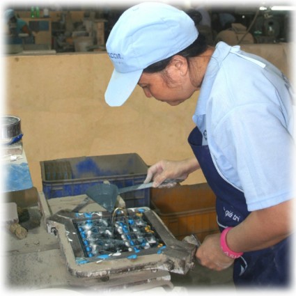 Pouring colours into the mould as the first layer