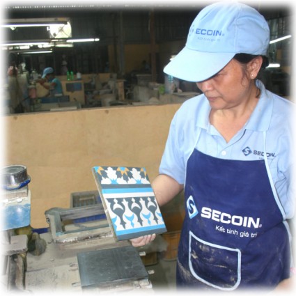 Forming tile and taking out tile from the mould